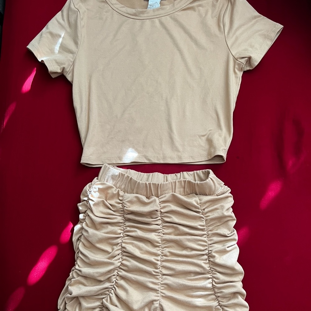 Beige XS Two piece set from fashion nova. Worn once. Top and bottom included.